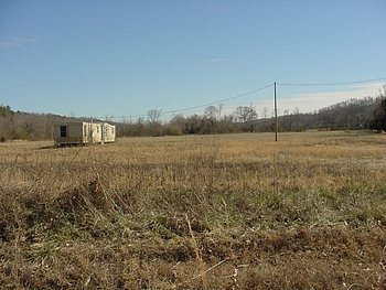 111 ACRES, LONG ROAD FRONTAGES, LARGE CREEK, LOTSA DEER/TURKEY